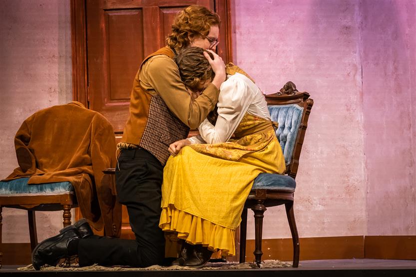 Students act onstage